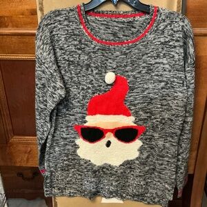 Funny Santa Sunglasses with 3D white pom on hat. Marled black and white sweater.